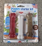 Nylabone Puppy Starter Kit With Healthy Edibles, Gentle & Graduate Wolf. Fixed Price $10.00.
