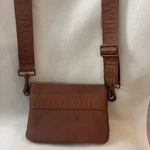 Wild One Dog Treat Pouch & Poop Bag Dispenser Wear 2 Ways Crossbody Fanny Pack. Fixed Price $18.00.