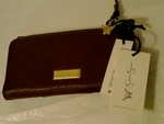 Jessica Simpson Wallet 4 X 7-1/2 Red/burgundy With Gold Colored Studs. Fixed Price $14.95.