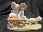 Homco 1993 Circle Of Friends Fall Bounty Boy & Girl W/dog Pulling Pumpkin Cart. Fixed Price $14.50.