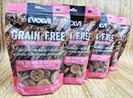 Set Of 4 Bags Evolve Grain-free Deboned Salmon & Chickpea Dog Biscuit Treats. Fixed Price $52.99.